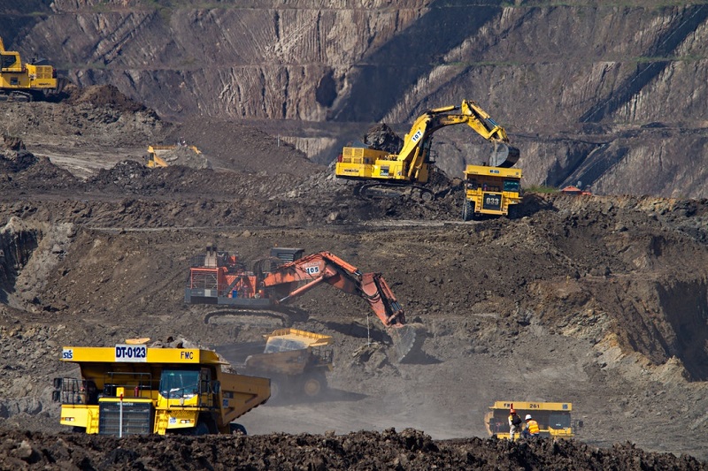 Heavy mining vehicles and equipment on site, representing fleet pre-start inspection workflows